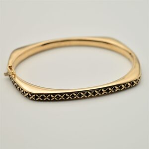 Women's 18 carat gold bangle bracelet, black pen 01 model